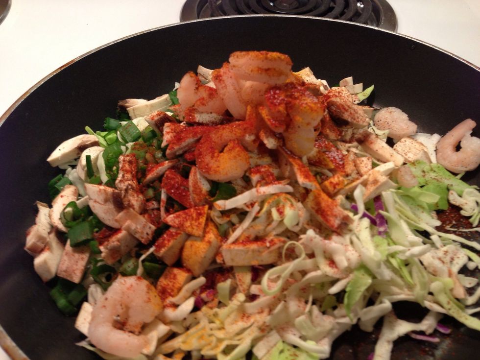 Add the chili powder, turmeric, and the paprika and stir for a couple of minutes