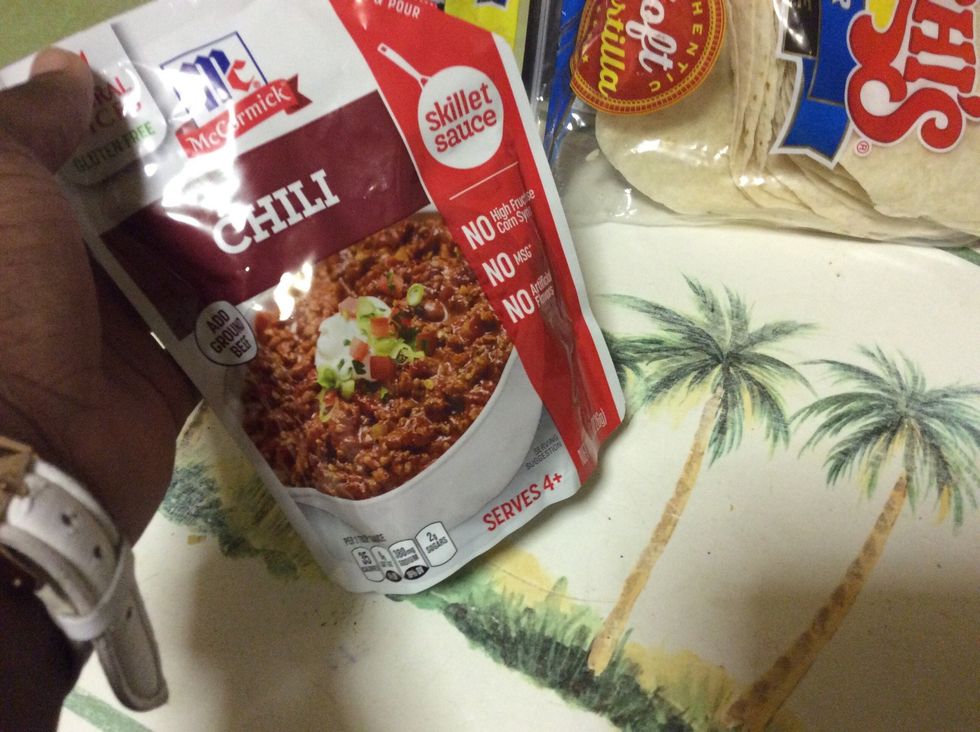 Add the chili sauce in with it and let it simmer for 5 mins