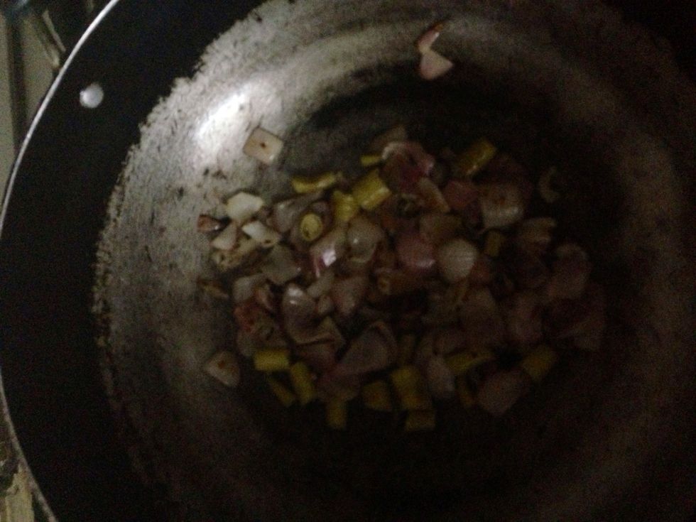 Add the chilies along with the soaked in vinegar. Saut\u00e9 Till vinegar dries up.