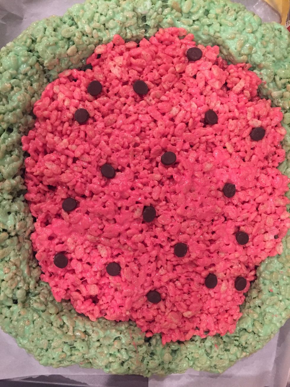 Add the chocolate chops on top for the seeds. Using mini morsels is better/more realistic, but I only had the regular size which'll do.