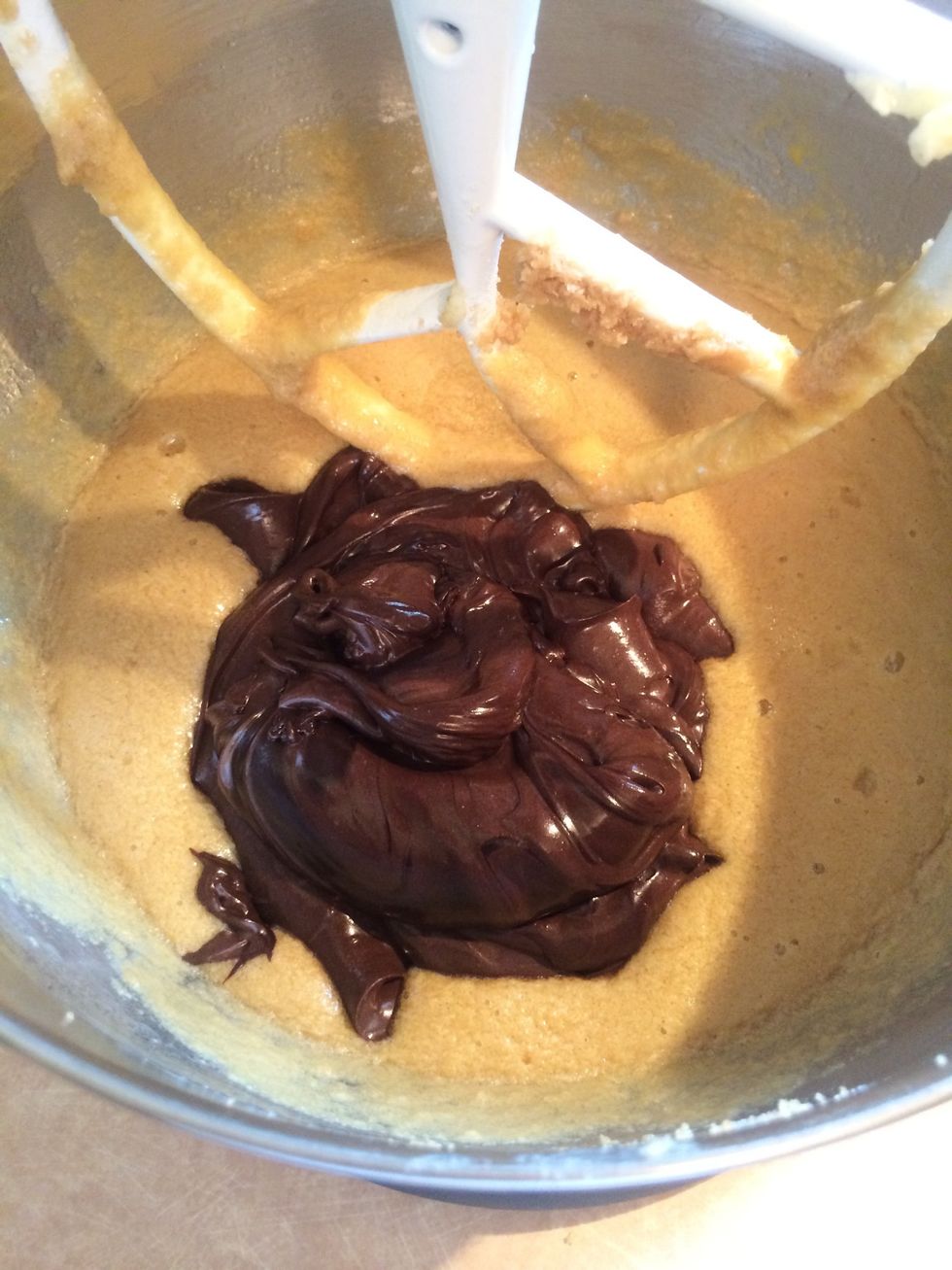 Add the chocolate sour cream blend to the brown sugar, butter and egg mixture.