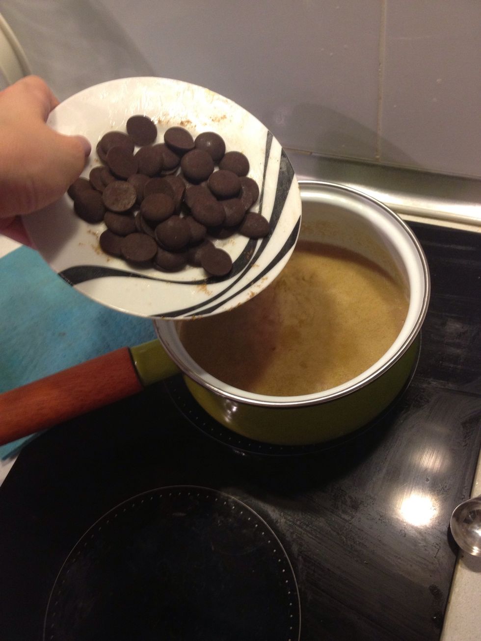 Add the chocolate to the hot liquid. That's 50 g. I keep 3 types of cacao barry's chocolate in my fridge dark (70%) milk and white. And 2 types of hershey's  unsweeten baking bars and semi sweet.