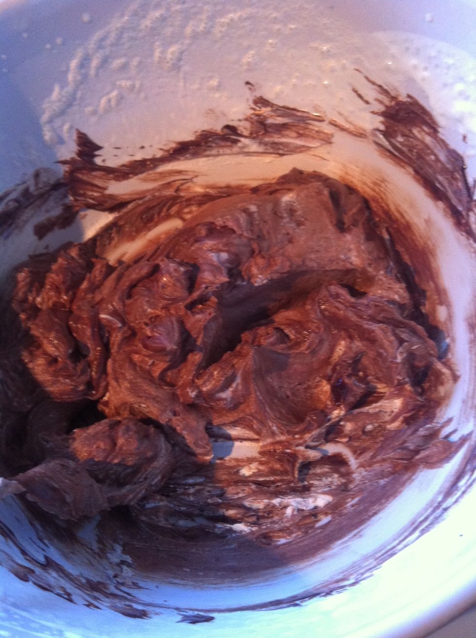 Add the chocolate to the whipped cream.