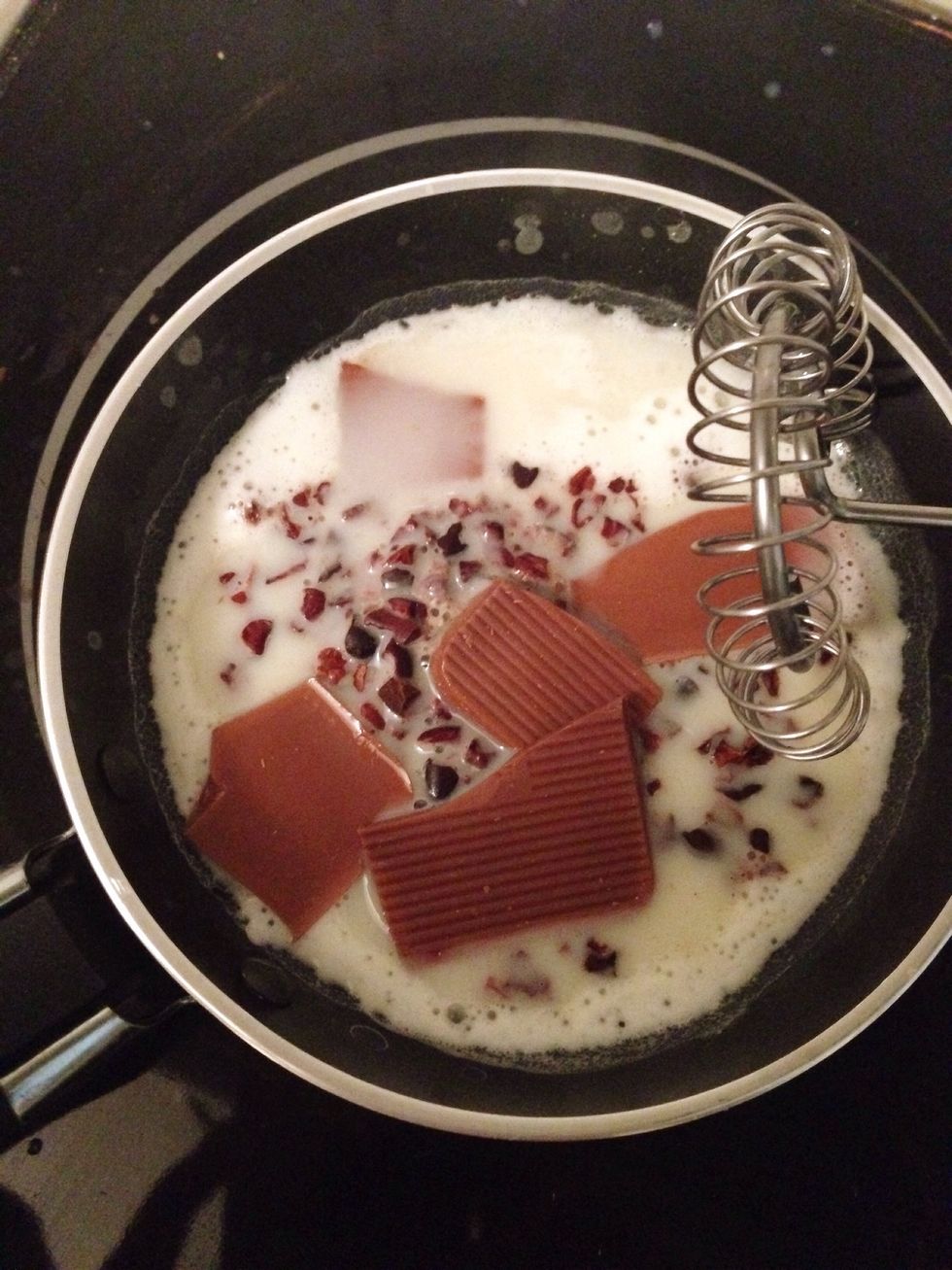 Add the chocolate. Wait for 3 minutes until the chocolate is melted and then stir.