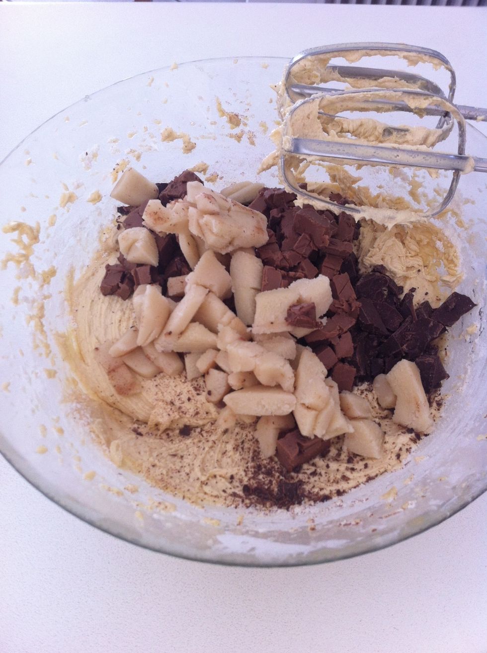 Add the chopped chocolate and marzipan into the mixture. Stir until mixed.