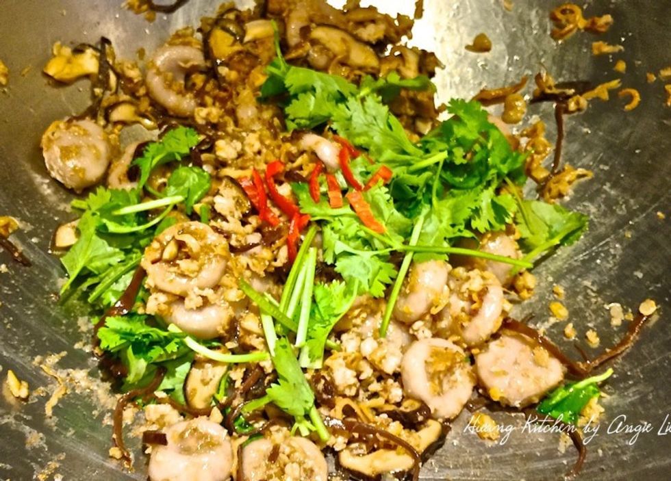 Add the chopped coriander and red chilli. Stir through another minute. Taste and add more seasonings, if needed.