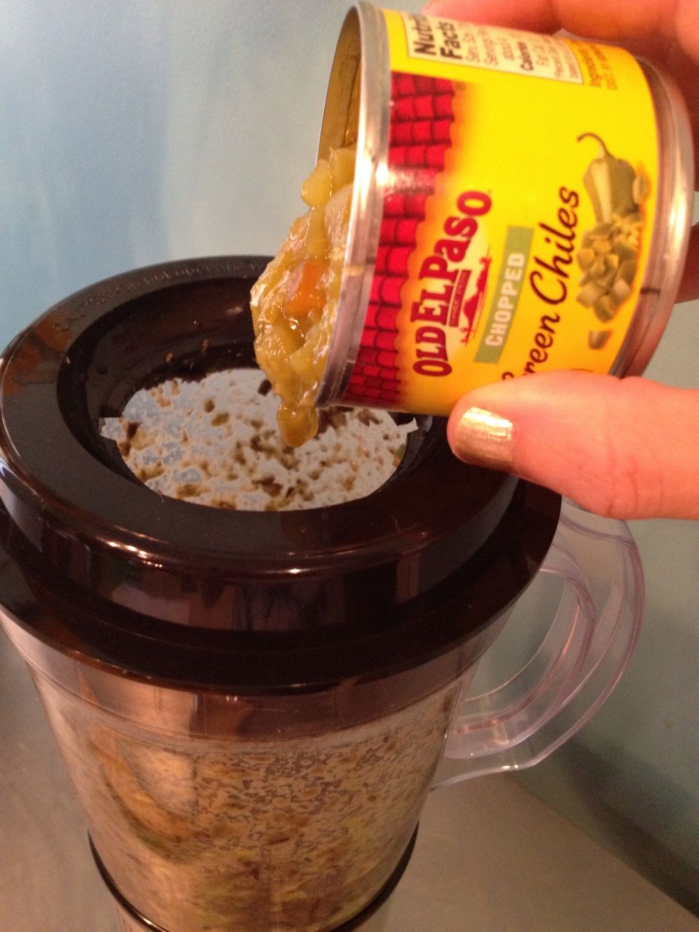 add the chopped green chilies, if you are NOT using cilantro, pulse. if you are using cilantro, see next step.