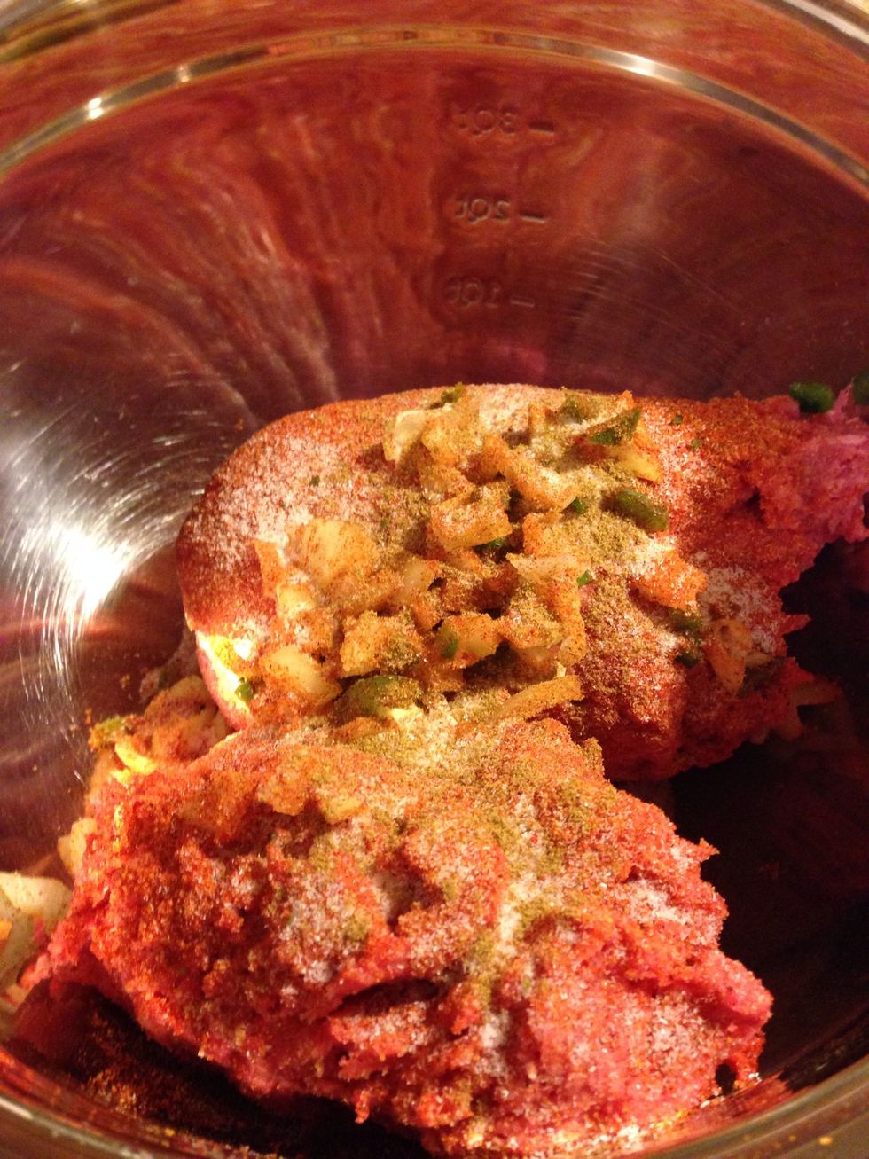 Add the chopped Jalepeno, Onion and seasoning to ground beef.