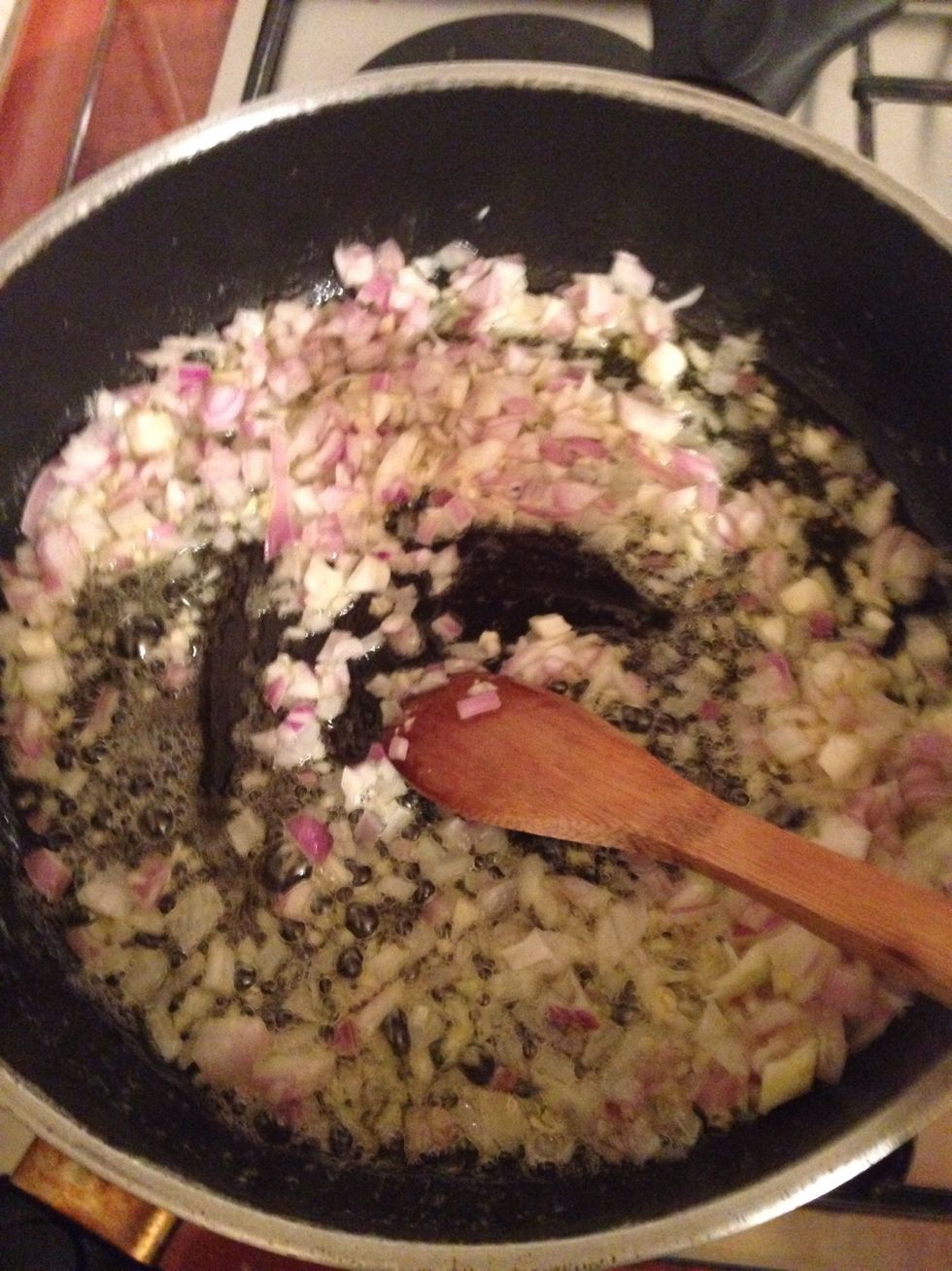 Add the chopped onion and garlic, and let it become transparent, it will take 5-7 minutes