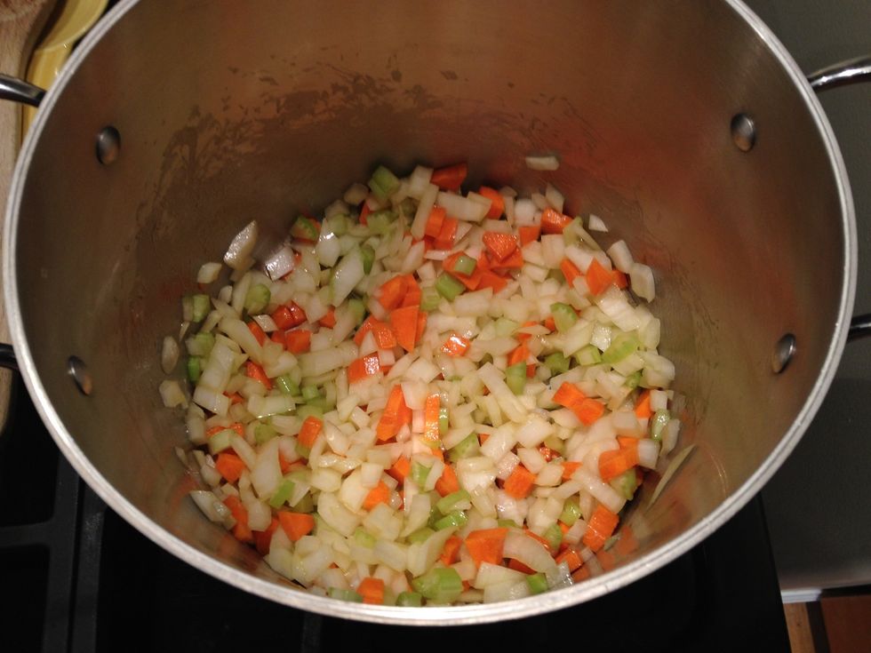 Add the chopped onion, carrots and celery. Cook until the veggies are tender. Remember to stir frequently.