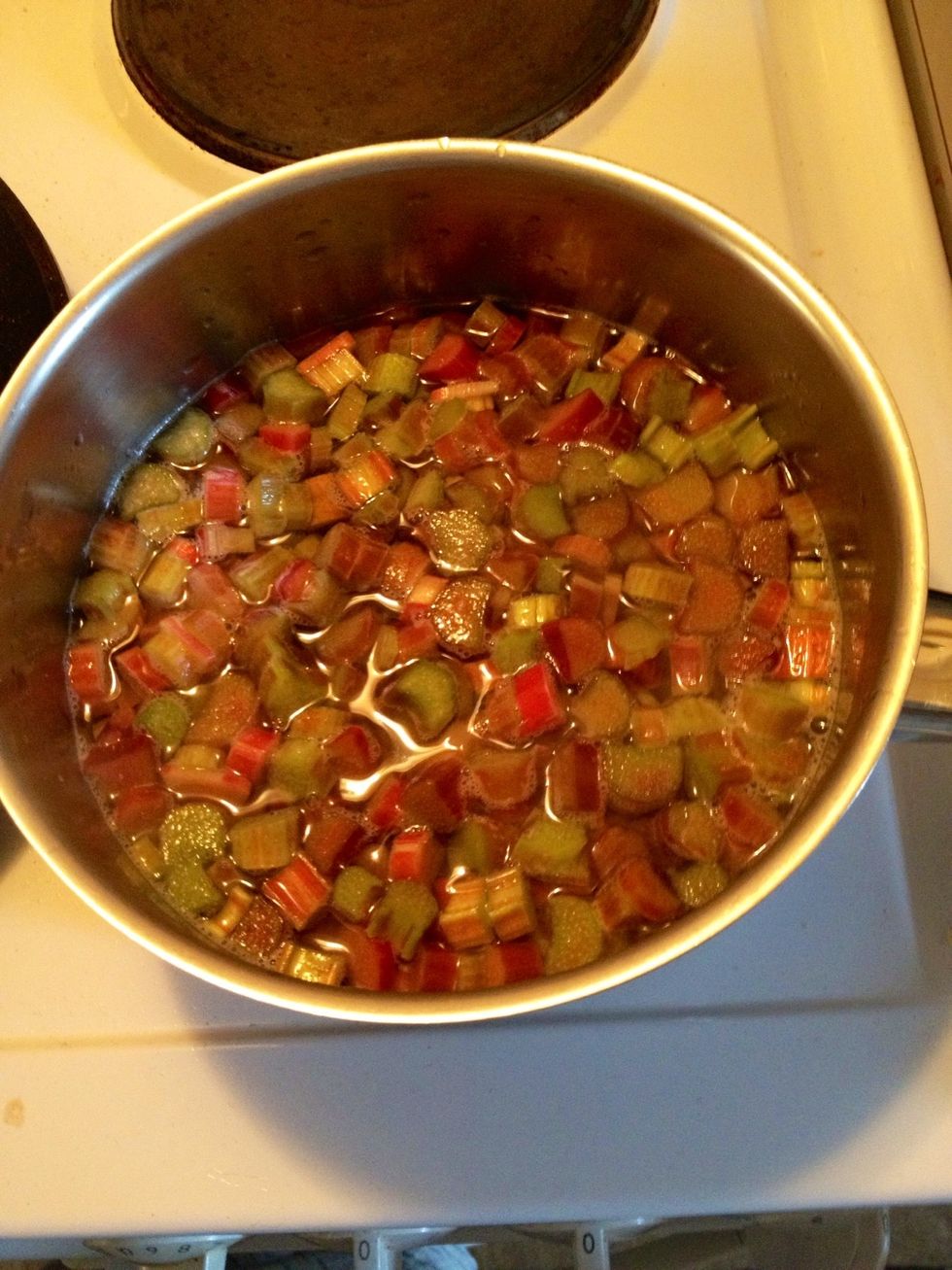 Add the chopped rhubarbs. Make sure the rhubarbs are covered. If you don't have access to rhubarbs, use apples instead, or strawberries and raspberries. Just remember to adjust the amounts of sugar.