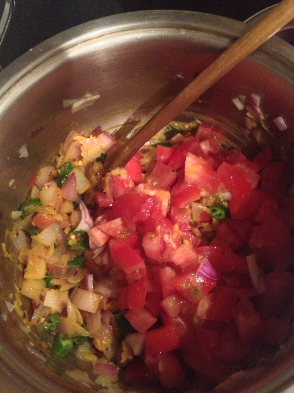 Add the chopped tomato.