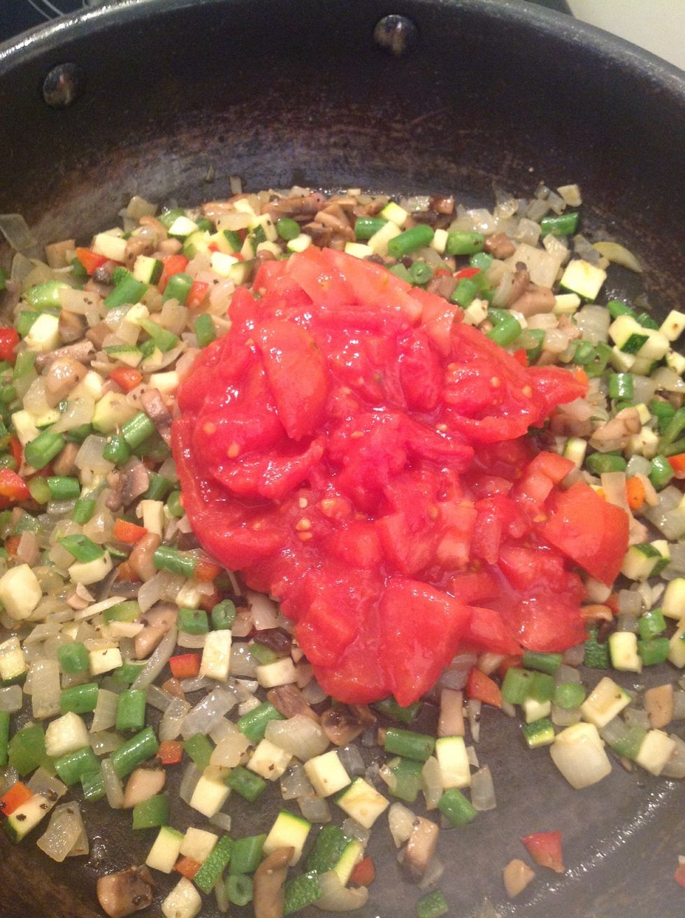 Add the chopped tomatos.