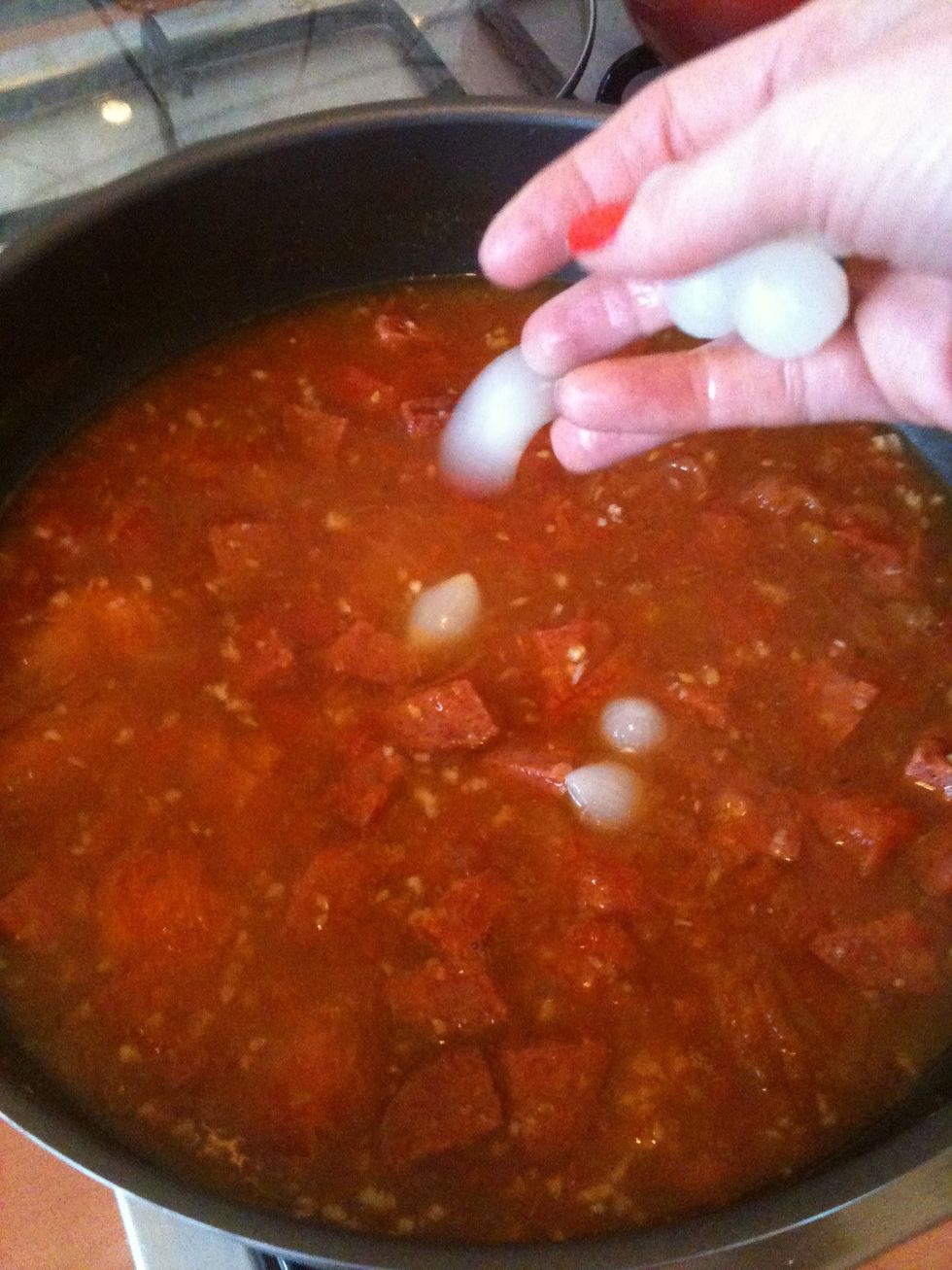 Add the chorizo, lemon juice, the onions and stir. Turn down the gass and leave it for about 15 minutes