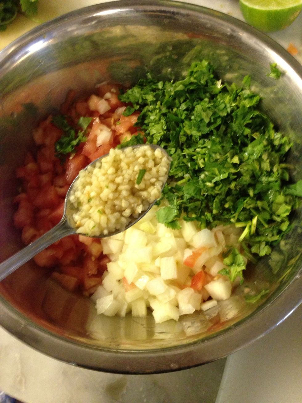 Add the cilantro and the garlic