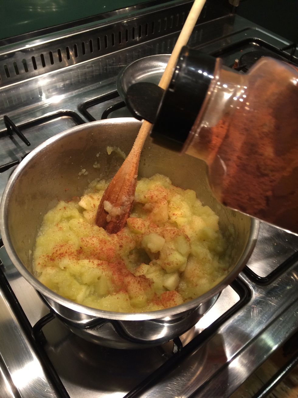 Add the cinnamon and stir through the apples