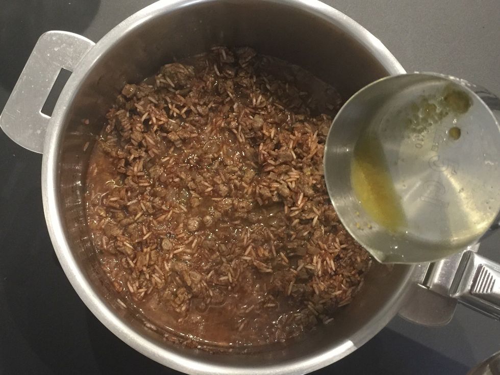 Add the cinnamon and the broth