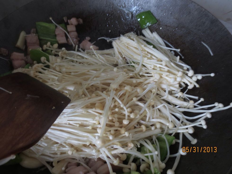 Add the clean enoki mushroom