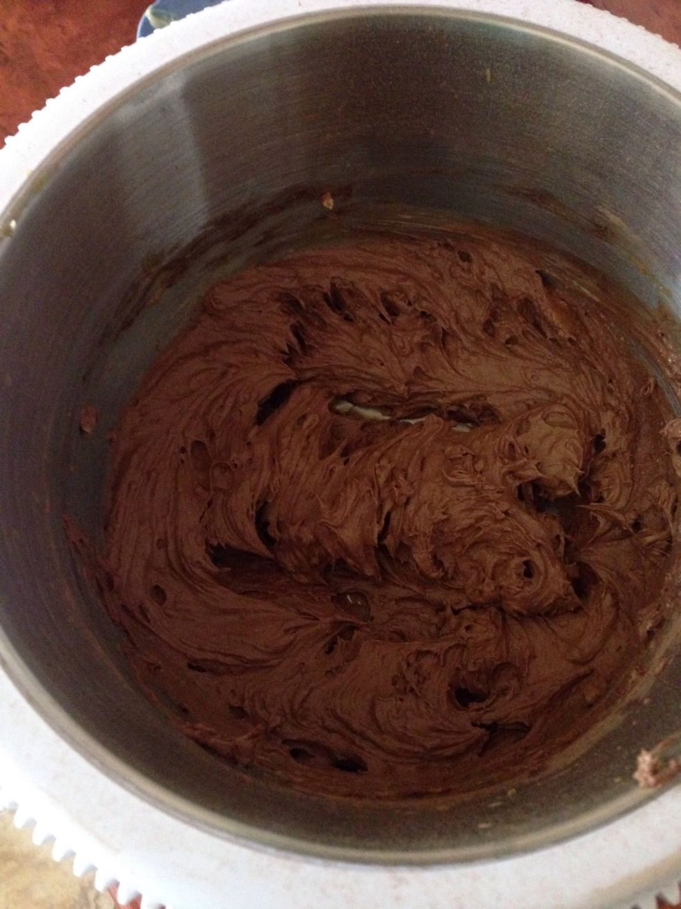 Add the cocoa and vanilla and mix until smooth.