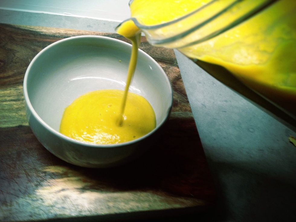 Add the coconut and ginger and give it all one more whirl in the blender. THIS is what it looks like -- ready to serve! Don't worry if you made too much. It freezes nicely.