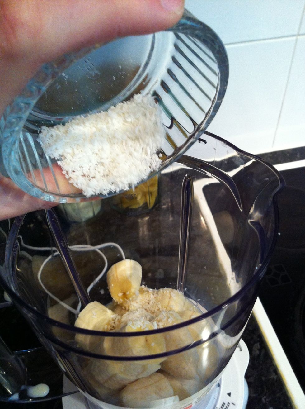 Add the coconut flakes to it.