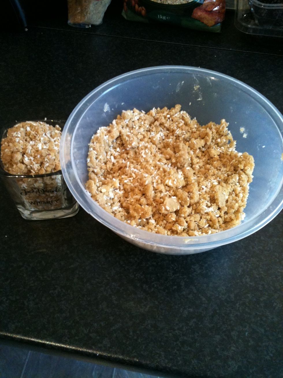 Add the coconut in to the mix. *** Take a cup of the mixture at this stage*** This will be used as a topping later.