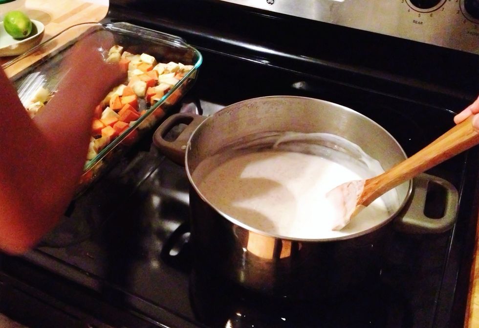 Add the coconut milk and salt. Stir well. Let the mixture return to a boil then remove from heat. Remove the potatoes from the oven, you should be able to insert a fork into them easily. Cool.
