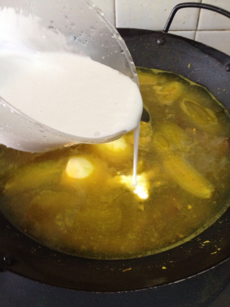 Add the coconut milk/cream and stir well. Simmer another 3-5mins at low fire. Close fire when gentle bubbles appear.