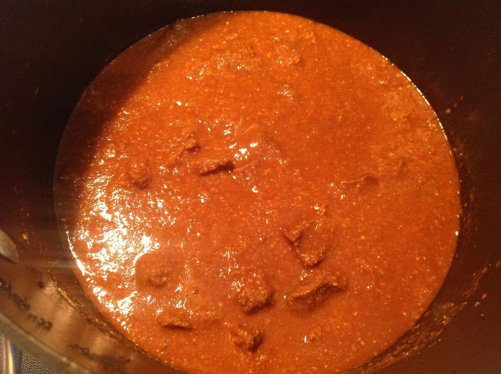Add the coconut / tomato mixture and water and simmer on a low heat until the beef is tender and sauce thickened, which is about 1 1/2 to 2 hrs.
