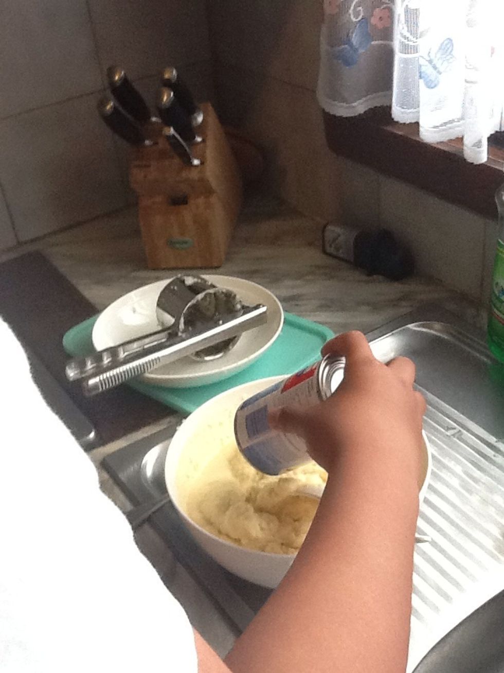 Add the condensed milk into the mash potato