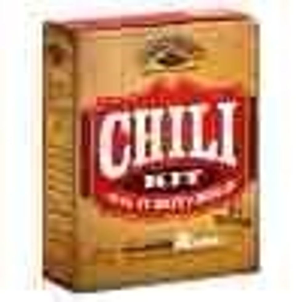 Add the contents of the chili kit. If you don't buy the kit add 1tbsp cumin and 1tbsp chili powder to start (add more later to taste, This is just a starting measurement) and about 1/2 cup of masa.