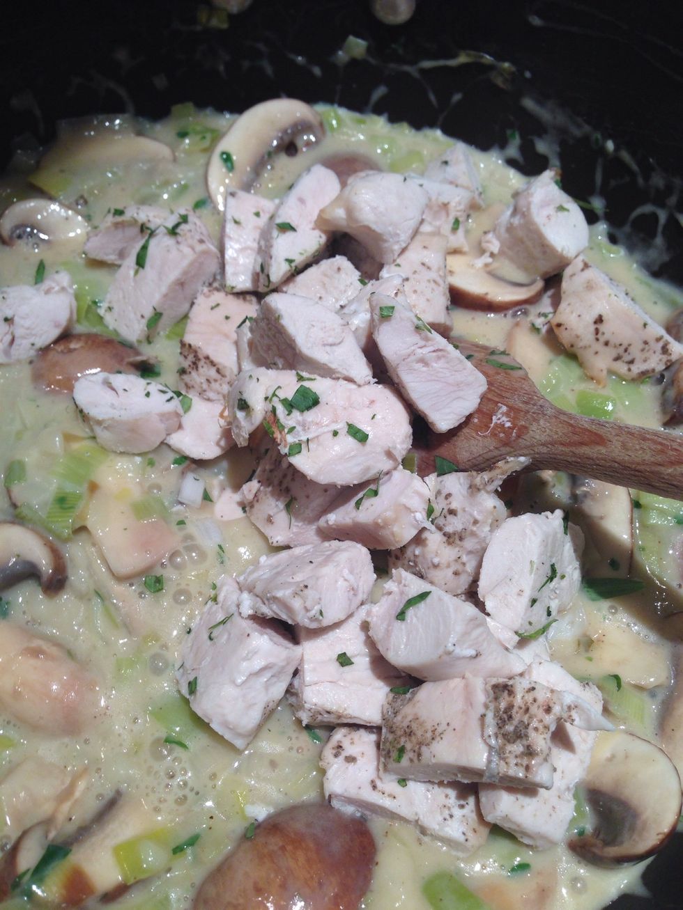 Add the cooked chicken and remove from the heat