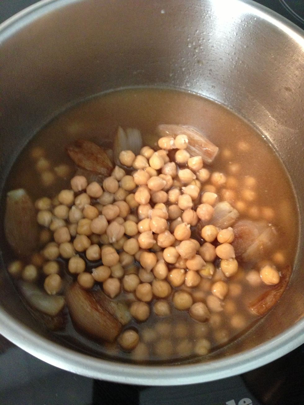Add the cooked garbanzo beans