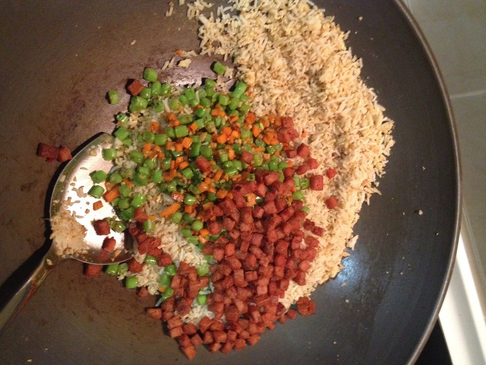 Add the cooked luncheon meat, French beans and carrot.