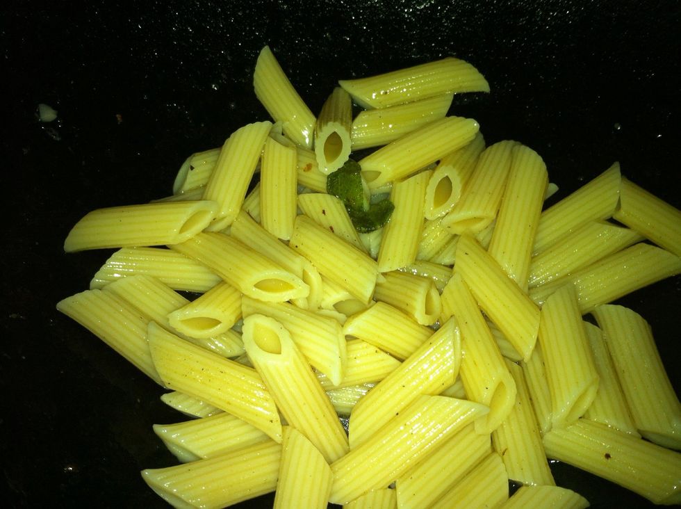 Add the cooked pasta and stir quickly to coat the sauce. Taste. Season with salt and pepper.