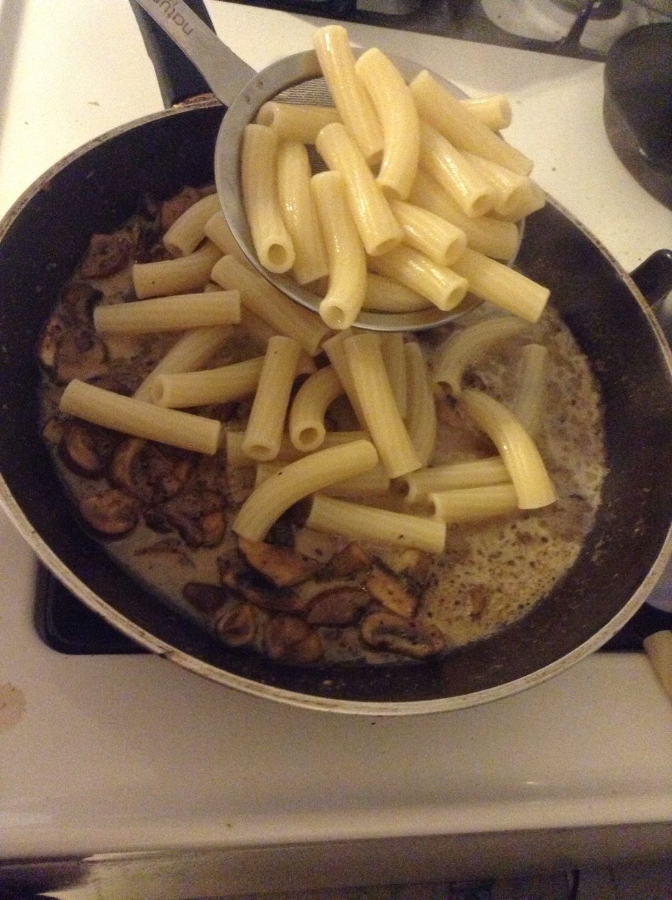Add the cooked pasta to the sauce. . .