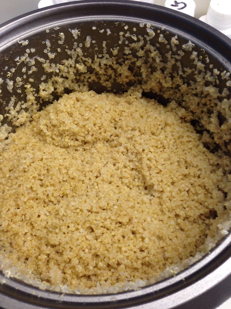 Add the cooked quinoa to the cheese mix