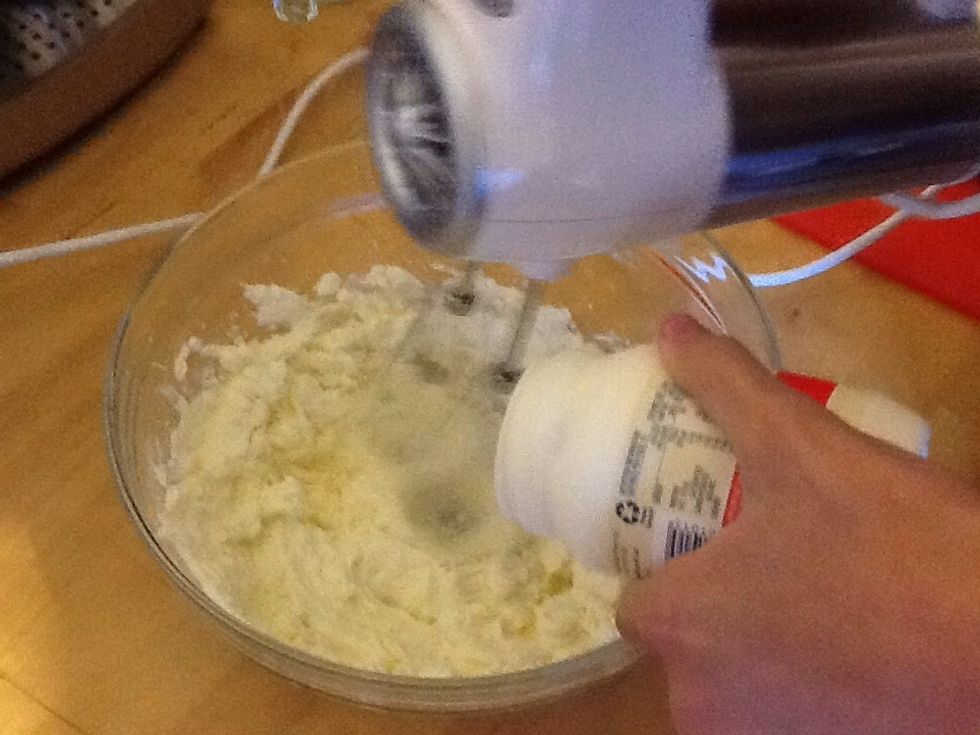 Add the cream and continue to beating until soft peaks