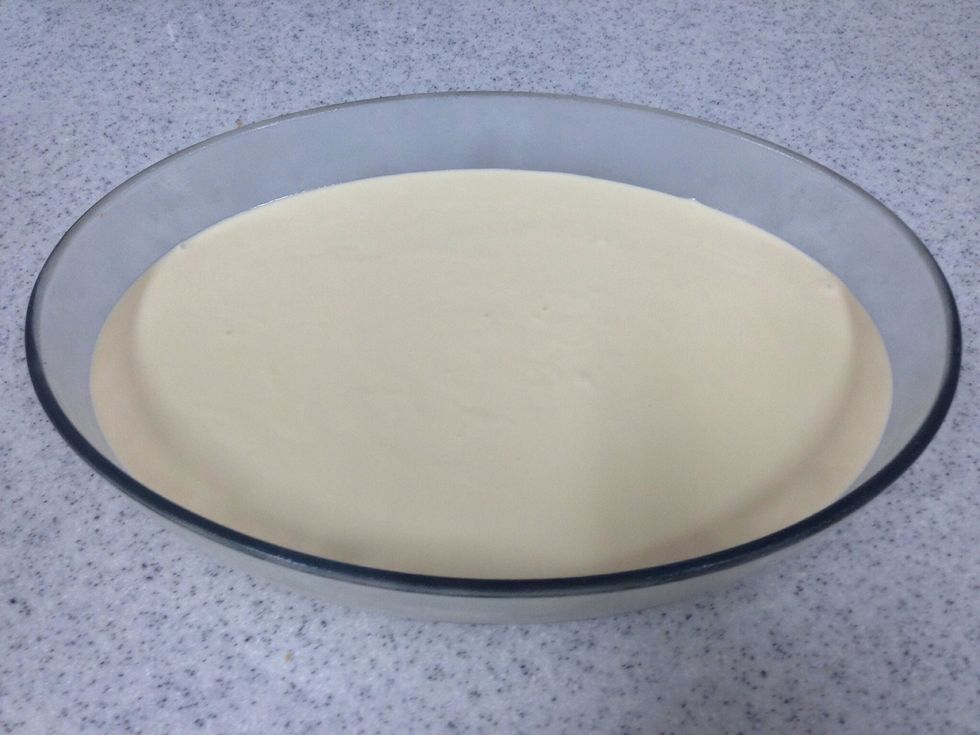 Add the cream mix over the biscuit and put them in the freezer again .