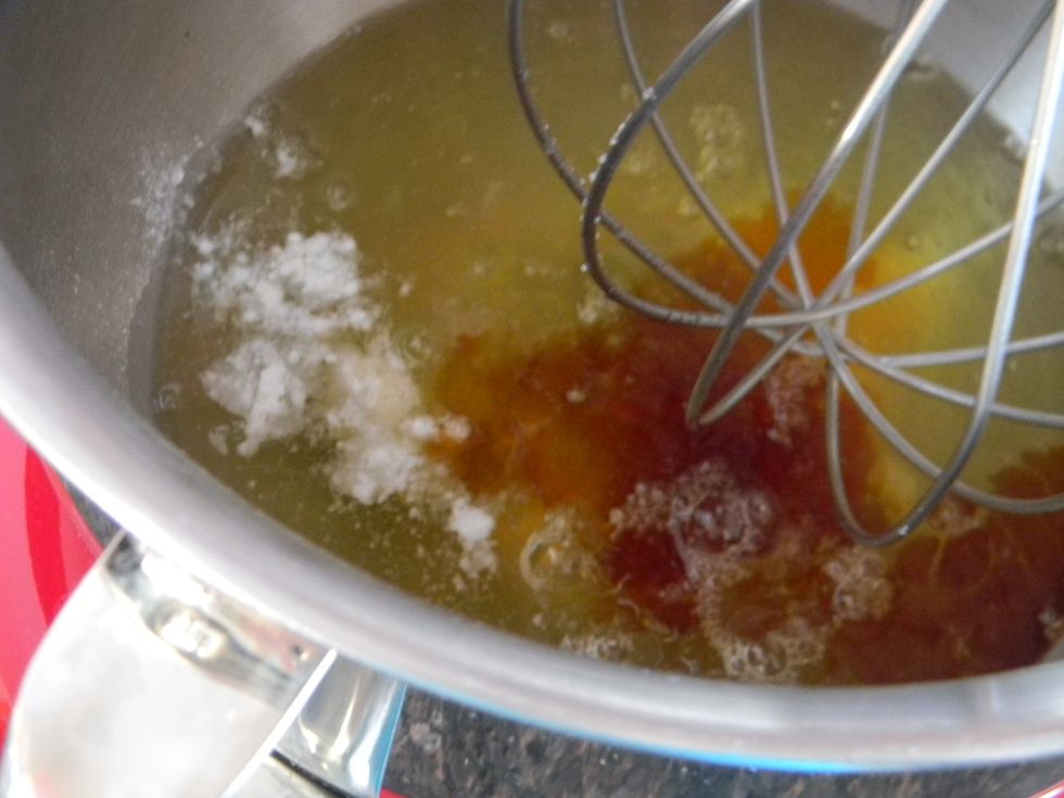 Add the cream of tartar, the vanilla extract and the salt to the egg whites and beat it on high for 1 minute.