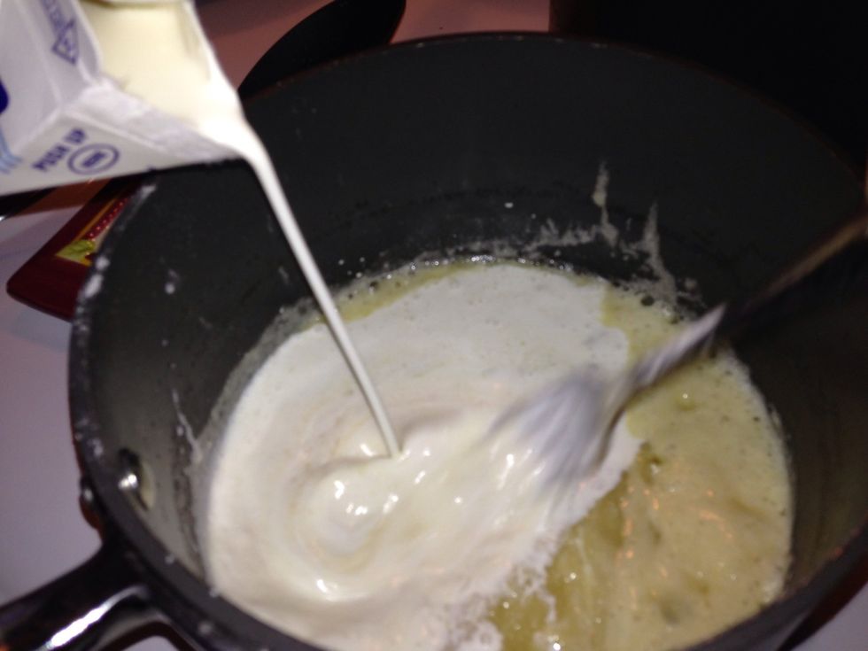 Add the cream, stirring CONTINUALLY until boiling. (if you stop stirring it will get lumpy and stick to bottom of pan).