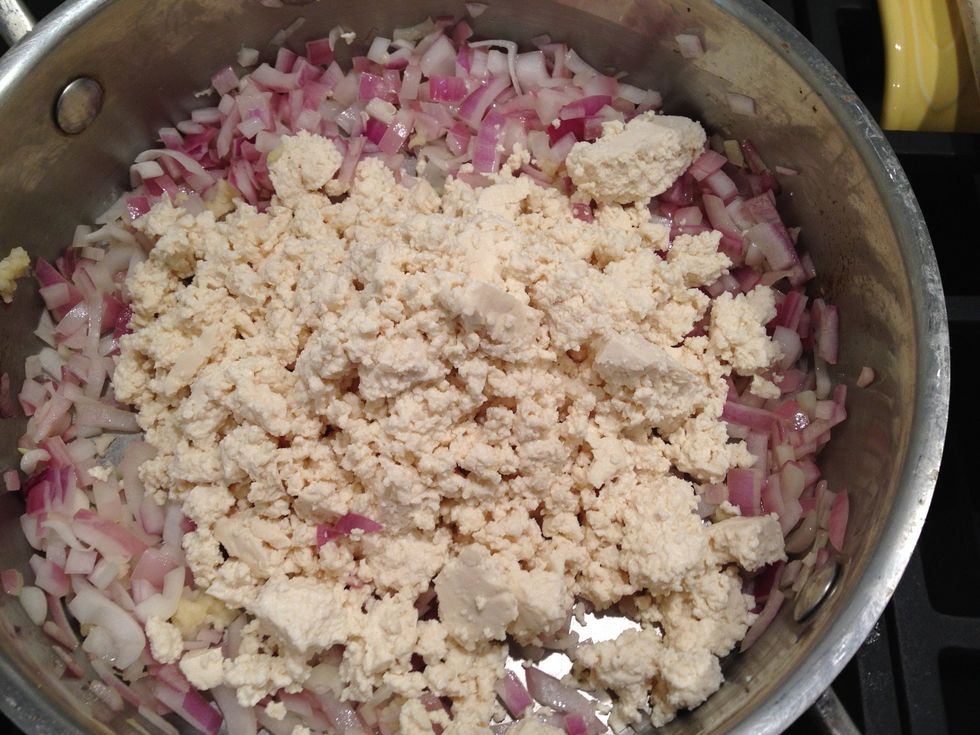 Add the crumbled tofu.