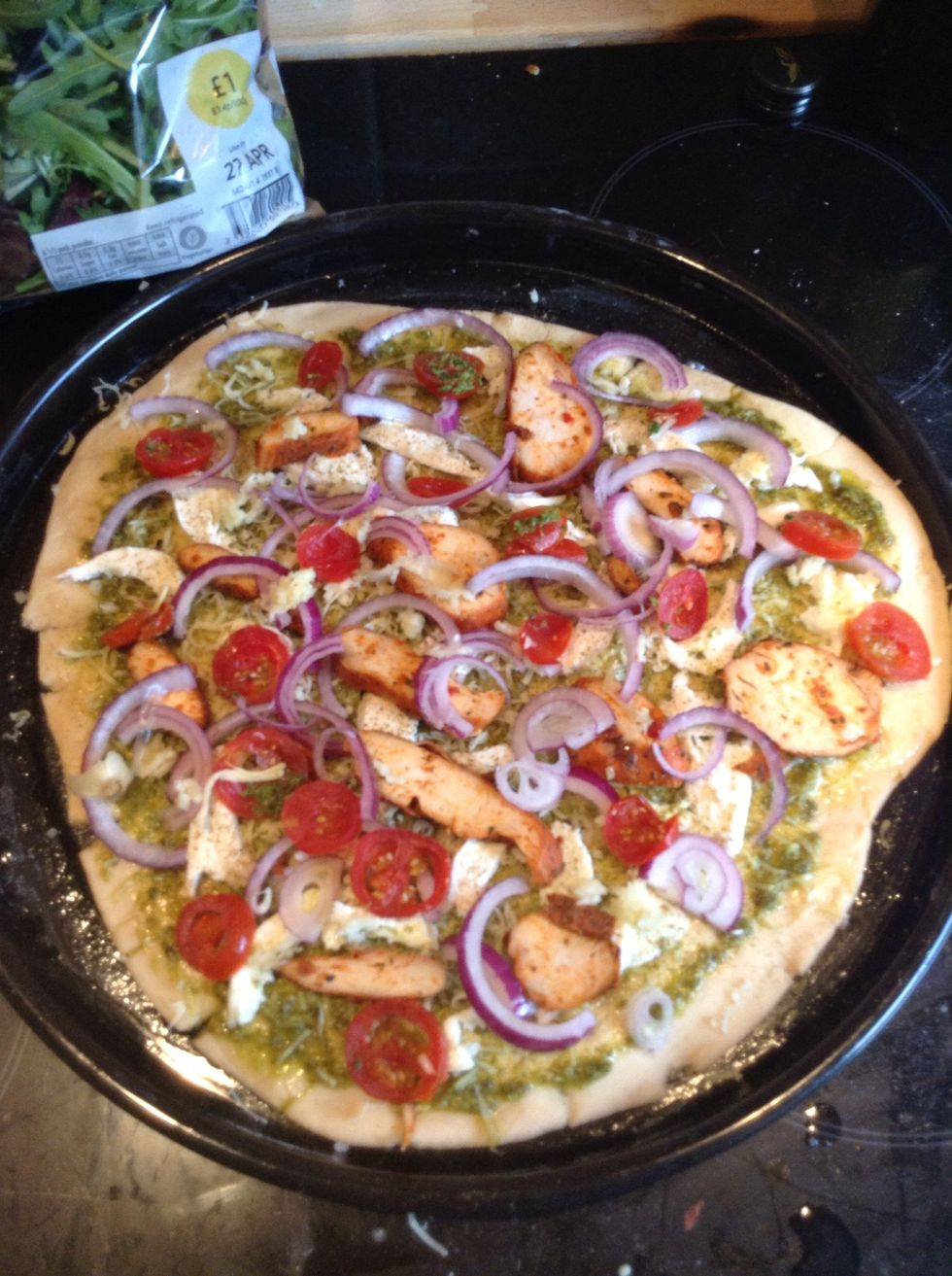 Add the crushed garlic and baby tomatoes