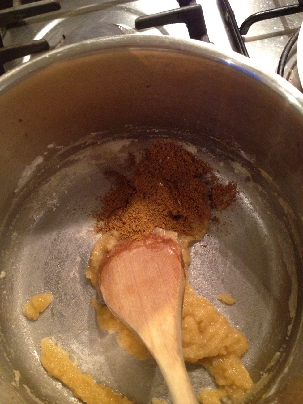 Add the curry and fry it along with the flour. I'm using a hot madras curry. Use any curry that you like.