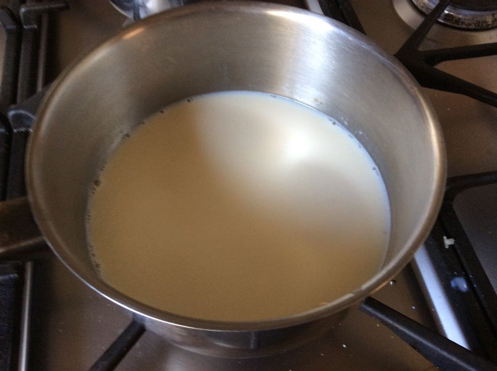 Add the custard and cups of milk into a sauce pan on low heat till it turns to custard. Remember to keep stirring.