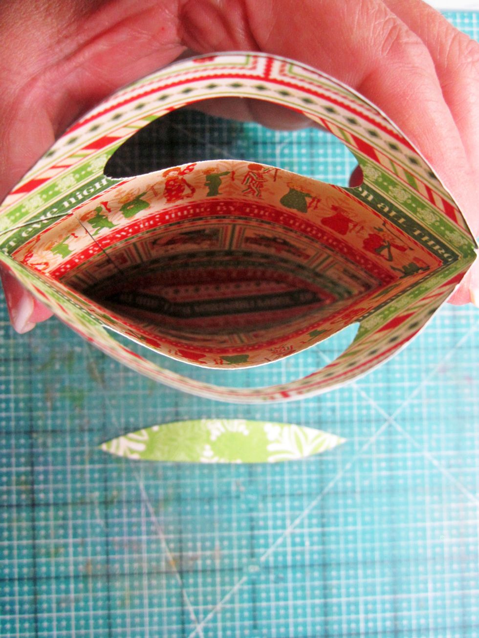 Add the cut out base to the inside of the baggie with glue. This will help the bag to be more stable and stay expanded.
