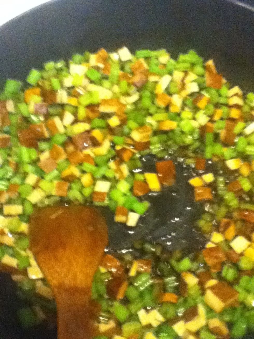 Add the dark soy sauce - I used about 2 tablespoons here.  If you are using regular soy sauce, use less, or else your food will be too salty.  Taste it to make sure it tastes good!