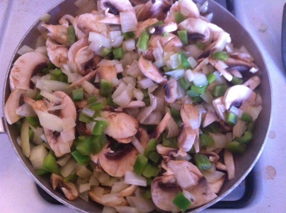 Add the diced green peppers; onion; and mushrooms saut\u00e9 until onions are translucent mix frequently