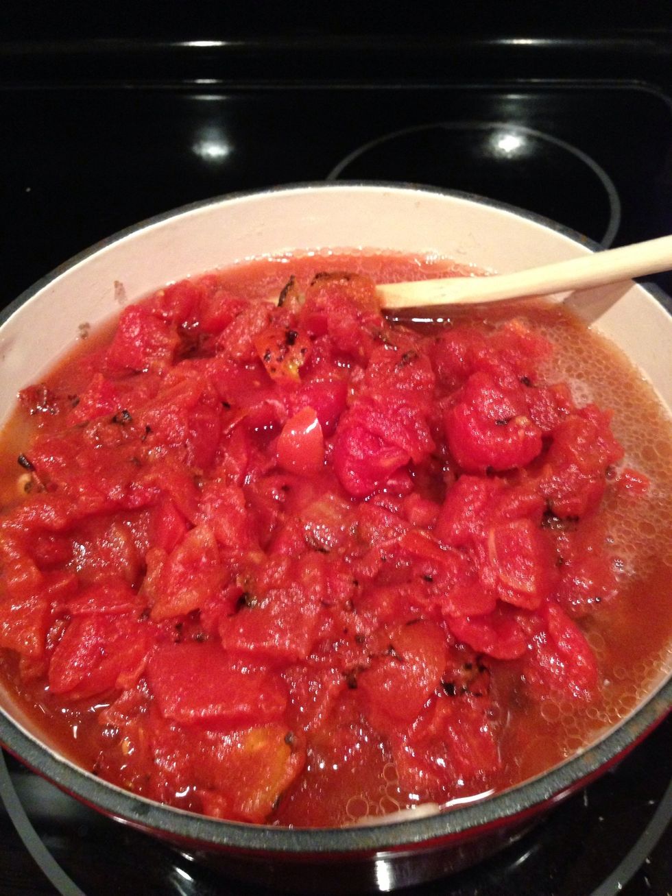 Add the diced or fresh tomatoes. Mix and cook for as long as you can over low heat.