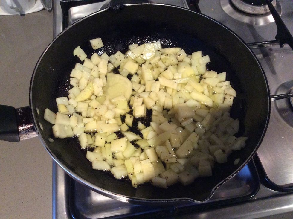 Add the diced potato into the oil after heated.